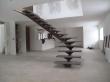 escalier métallique limon central débillardé tournant marche bois