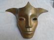 Masque décoratif en terre cuite patinée ,en vente sur Luckyfind.fr