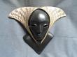 Masque intitulé Othello en terre cuite peinte signé EMR ,collection privée.