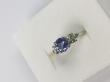 Bague or gris Tanzanite et péridots