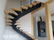 escalier métallique tournant limon central débillardé marche bois