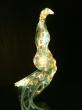 Em est le portrait de ma mère composé de trois thématiques : ses couleurs préférés, ce qu’elle aime par dessus tout, son thème astral occidental et chinois, sa fleur préférée.

La sculpture est réalisée en résine et est incrustée de fibres optiques, c’est une technique unique au monde que seul Sculi pratique. Qui est déposée à l’INPI.

La sculpture fait partie du courant Cosmomorphisme qui a pour principe de faire rencontré plusieurs &oelig;uvres dans la même œuvre. Il est appliqué ici par strate qui se décline par une composition de forme, de dessin picturaux réalisé avec des pigments, et dessins de lumière incrustés dans la matière. 