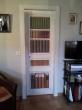fausse bibliothèque sur porte