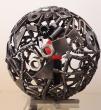 sphère constituée de petites pièces 30 cm de diamètre