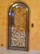 Porte intérieur avec en partie extérieur de l'acier polie miroir, au centre un miroir recouvert d'une grille en fer rond 