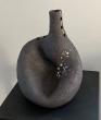 vase en grès noir, incrustation de porcelaine et filet or

Prix :139€